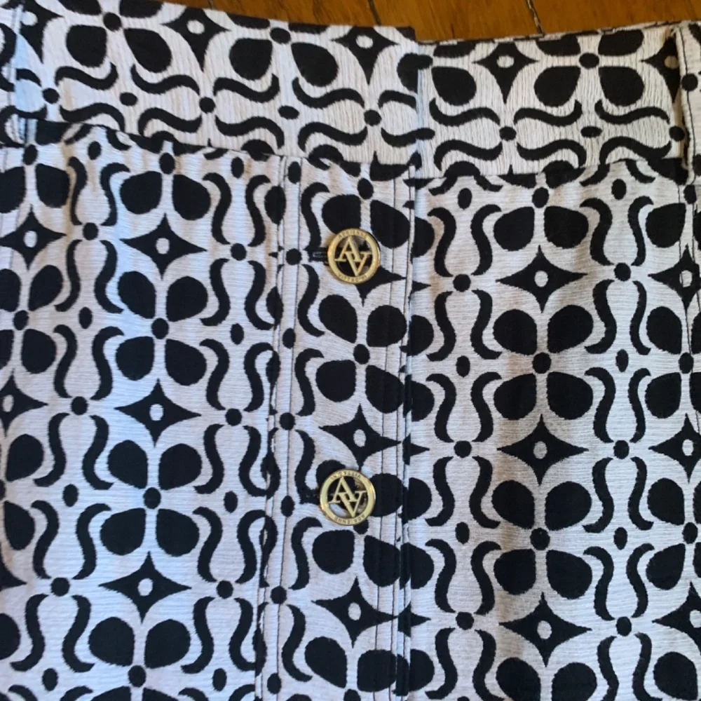 Adrienne vittadini 100 percent‎ cotton logo button skirt. Never worn. Retail 120